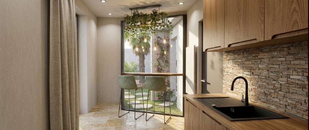 Cuisine en bois ouverte sur un patio intérieur, villa de Biscarrosse